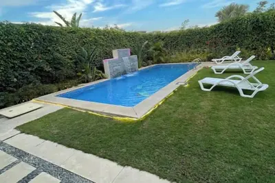 Image de 6-bedroom villa with pool & garden in palm hills-new cairo