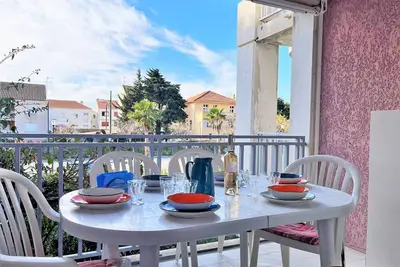 Image de Appartement 6 couchages à 100m plage avec terrasse, parking, lave-linge et piste cyclable proche