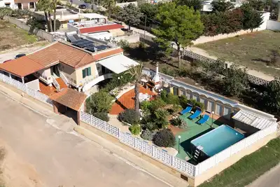 Image de Villa 'Malva House In Con Piscina' avec piscine partagée, Wi-Fi et climatisation