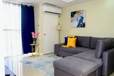 Gated 1-bedroom Condo in Portmore with Ac, WiFi, Pool, Kitchen, Tv, Beach View