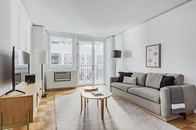 Image de Open Midtown W 2br w/ Gym, Rooftop, Doorman & W/D, by Blueground
