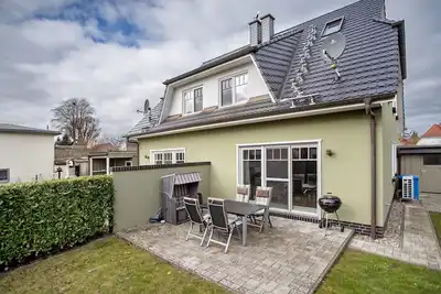 Image de Maison de vacances 'Ferienhaus Annmette' avec terrasse privée, jardin privé et Wi-Fi