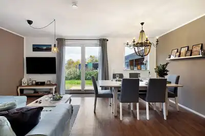 Image de Maison de vacances 'Küsten-Bude' avec terrasse privée, jardin privé et Wi-Fi