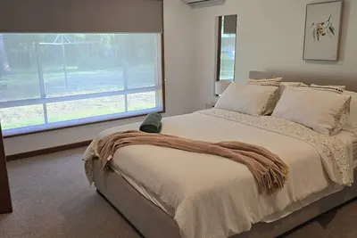 Image de Escape to serenity at our Family stay, enveloped by majestic Tuart trees.