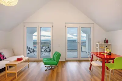 Image de Appartement 'Ferienwohnung Vogesenpanorama 2' avec vue sur les montagnes, terrasse privée et Wi-Fi