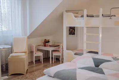 Image de Appartement 'Familienzimmer Nr 2 - Mit 2 Kindern' avec terrasse partagée et Wi-Fi