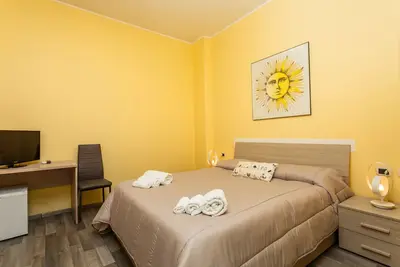Image de Chambre 'Seaside and City - Quadrupla' avec Terrasse partagée, Wi-Fi et Climatisation