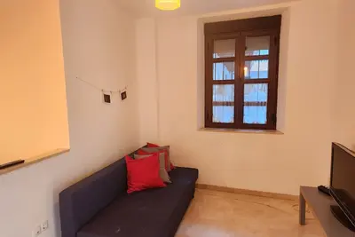 Image de Cozy and quiet apartment in the center next to the city wall.