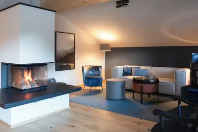 Image de 03 Michl, 85 sqm, 2 bedrooms, balcony, sauna, tiled stove