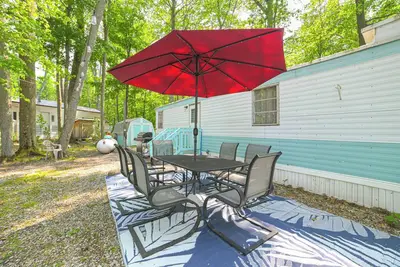 Image de Walk to Manistee Lake: Retro Cottage w/ Fire Pit!