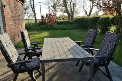 Image de Maison de vacances 'Haus Deichtraum' avec terrasse partagée et Wi-Fi