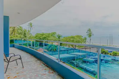 Coastal condo with sea views, balcony & resort amenities