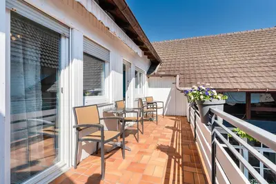 Image de Appartement 'Schrammis Ferienwohnung - 4 Zimmer' avec terrasse partagée, jardin partagé et Wi-Fi