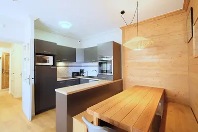 Image de Appartement standing chalet avec piscine skis aux pieds