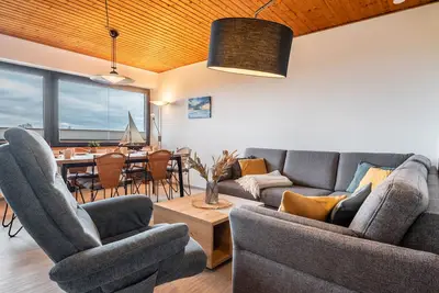 Image de Appartement 'Ferienwohnung 27 Sandbank, 80 Qm' avec vue sur la mer, balcon et Wi-Fi