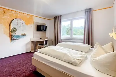 Image de Comfortable and versatile room -perfect for relaxation, work and exchange