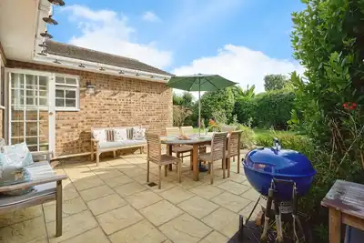 Image de Coastal Cottage is a charming, dog-friendly, 3-bedroom family bungalow