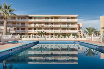 Image de Appartement 'Vistas A Los 2 Mares' avec vue sur la mer, piscine partagée et climatisation