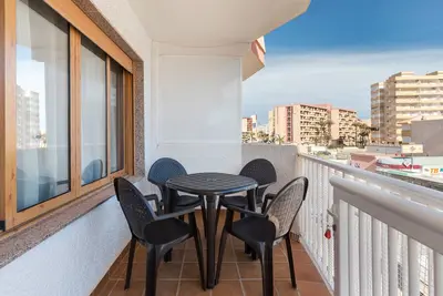 Image de Appartement 'Arena De 2 Mares' avec vue sur la mer, piscine partagée et terrasse privée
