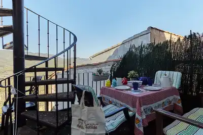 Image de Chambre 'La Alcoba Vieja - Suite - Apto' avec vue montagne et terrasse privée