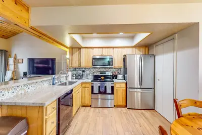 Country style condo with fire pit, private W\/D, and full kitchen