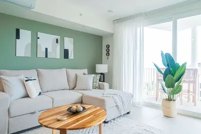 Beachfront condo with direct sand access, ocean views & vibrant nightlife nearby