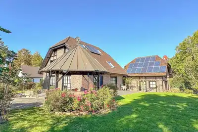 Image de Maison individuelle spacieuse avec poĂŞle Ă bois
