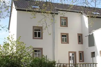 Image de Cozy Eifel vacation apartment; modern standard in a historic ambience!