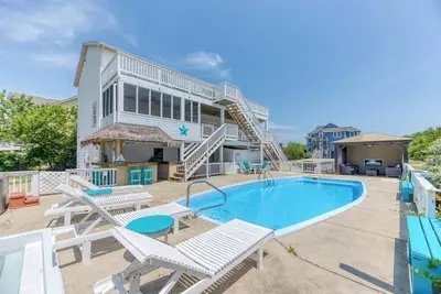 Partial ocean and sound views from this coastal Corolla getaway!