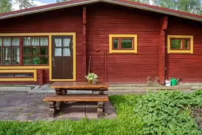 Image de Cosy Red log cabin for a family by a beautiful Finnish lake!