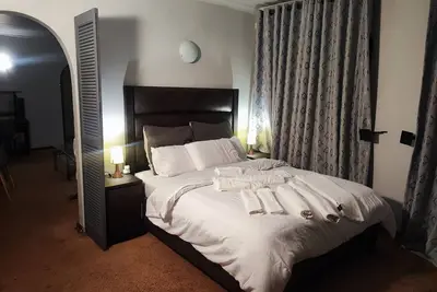 Image de Tranquil cottage with WiFi and pool in Boksburg; Home away from home.
