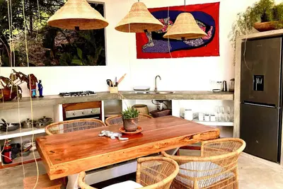 Image de Peaceful and secluded beach house with a private tropical garden