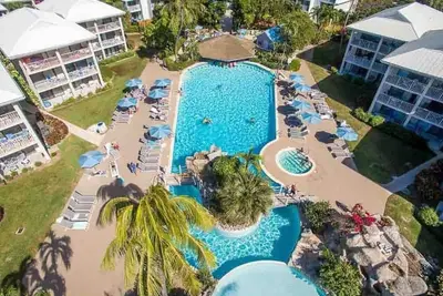 Image de 119 Condo Sunset Cove Ocean Pool Seven Mile Beach