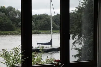 Image de Appartement \"Fewo 2\" avec vue sur le lac, jardin privé et Wi-Fi