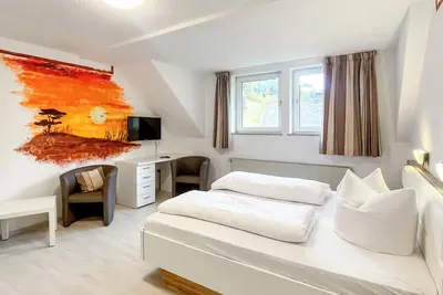 Image de Comfortable and versatile room -perfect for relaxation, work and exchange