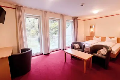 Image de Comfortable and versatile room -perfect for relaxation, work and exchange