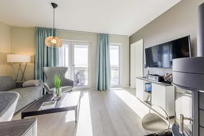 Image de 5 star vacation apartment Strandomizil with infrared cabin - vacation at the Baltic Sea Bodden