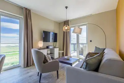 Image de 5-star Boddenidylle vacation apartment with balcony and view of the Bodden and Baltic Sea