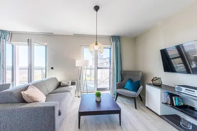 Image de 5-star vacation apartment SommerglĂĽck on the Baltic Sea, including beach chair.