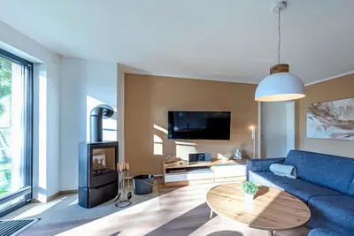 Image de 5-star vacation apartment SonnengruĂź with a side view of Lake Krakow