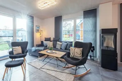 Image de 5-star vacation home Ostseetraum on the water with fireplace, terrace and Bodden view