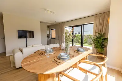 Image de Huswell - Charming Apartment with Garden & Parking