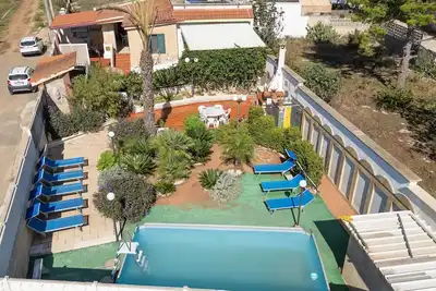 Image de Appartement Tritone dans une Villa de Luxe avec Piscine Partagée