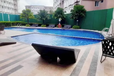 Image de Staycation for 4 - AirCon \/ Hot Shower \/ pool