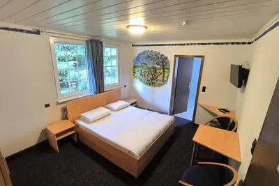 Image de Comfortable and versatile room-perfect for relaxation, work and exchange
