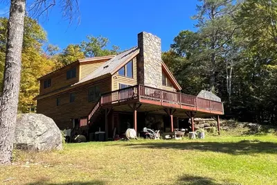 Image de 18+ acres! Sun drenched 5 bedroom. 12 min from Okemo! Vast trails 5 min away!