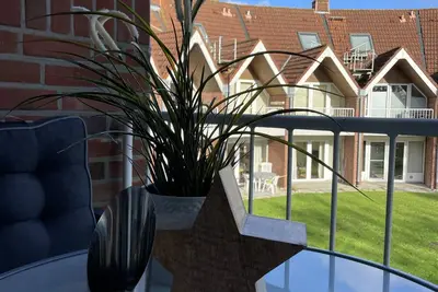 Image de Appartement 'Godewind App A4 Am Ostseestrand' avec vue sur la mer, jardin partagé et Wi-Fi