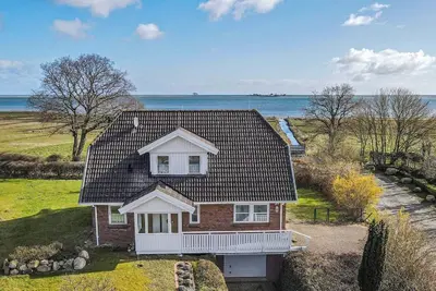 Image de Pippilotta - directly on the water, sauna, whirlpool, winter garden, terrace, fireplace