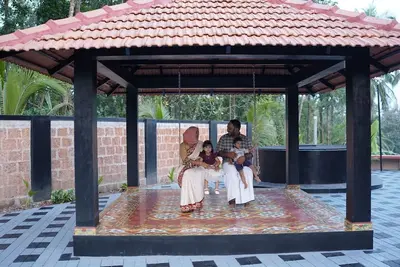 Image de \"Welcome to Malabar Serenity: Where Tradition Meets Tranquility\" 3