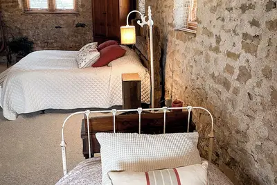Image de Tucked beneath our historic 1895 German bank barn, is the Bunkhouse!
